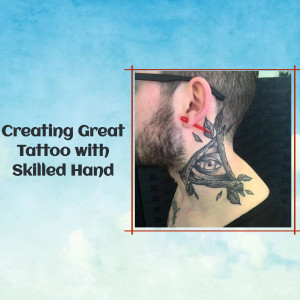 Close-up of a man with a detailed eye and branch tattoo on his neck.