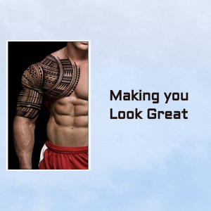 Man with a detailed Polynesian tattoo on his shoulder and arm