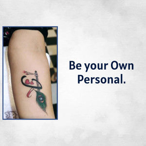 Close-up of a Radha Krishna tattoo on an arm