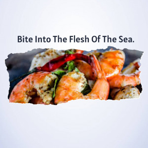 Close-up of a spicy crab dish with red chili pepper and herbs