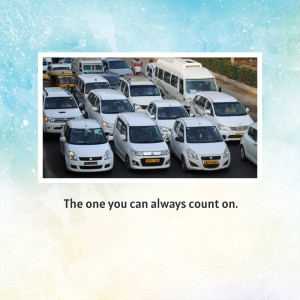 A busy city street with a line of white cars in traffic.