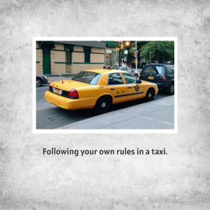 Yellow taxi cab parked on a city street in New York