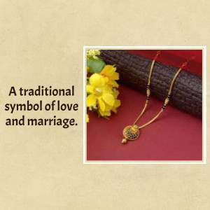 Close-up of a gold and black beaded mangalsutra with a floral background.