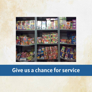 Shelves stocked with various colorful food and snack boxes in a grocery store.