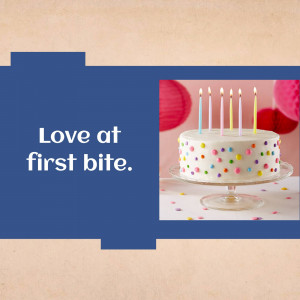 A beautifully decorated birthday cake with lit candles.