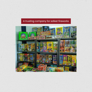 A shop shelf filled with various colorful firework boxes.