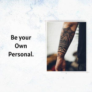 Close-up of a person's arm with a detailed black mandala tattoo.