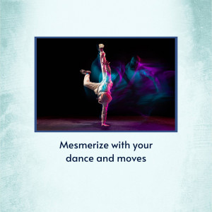 A dancer performing a handstand on a stage with dramatic lighting.