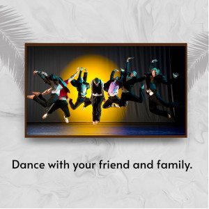 Group of dancers performing on stage under a spotlight