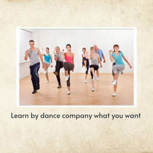 People participating in a dance fitness class in a studio.