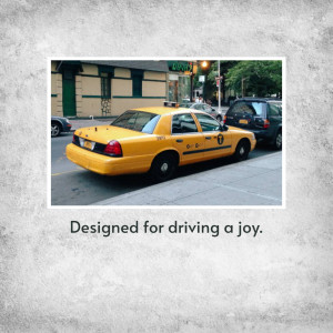 Yellow taxi cab parked on a city street