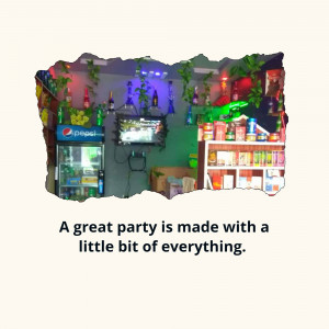 Interior view of a small local shop with a refrigerator, shelves, and decorations.