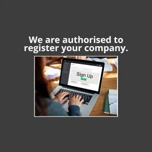 Laptop displaying a sign-up page with text about company registration