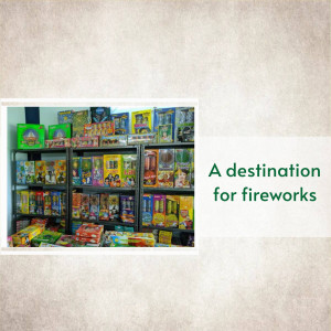 A shelf filled with various types of fireworks boxes.