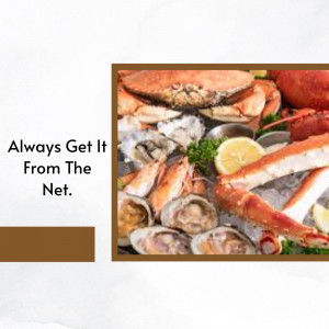 A close-up of a luxurious seafood platter with crab, lobster, oysters, and clams.
