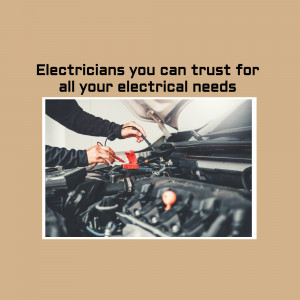 Electrician working on car electrical system