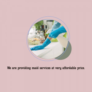 Person cleaning a kitchen counter with spray and cloth