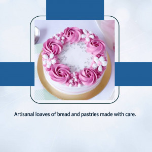 Close-up of a beautifully decorated pink rose cake on a wooden surface.