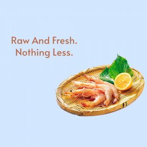 Raw shrimp, lemon, and greens on a woven tray