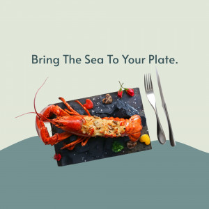 A beautifully presented cooked lobster on a slate plate with cutlery.