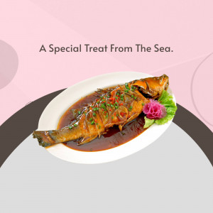 A beautifully plated sweet and sour fish dish with vibrant colors.