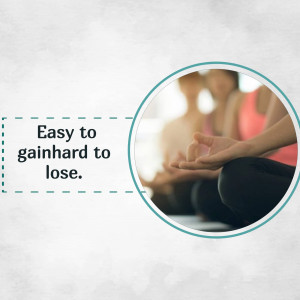 People meditating in a group, promoting weight loss.