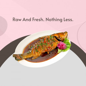 A close-up of a beautifully steamed fish dish with a vibrant sauce, garnished with chili, ginger, and greens.