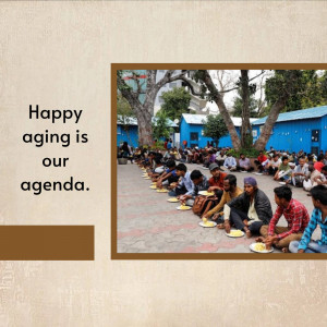 A group of people sitting on the ground eating a meal together, with text 'Happy aging is our agenda'.