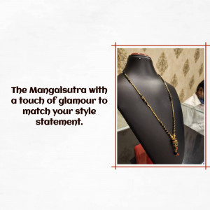 Black mannequin displaying a gold and black beaded mangalsutra necklace.