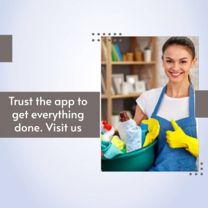 Woman in apron holding cleaning supplies and smiling