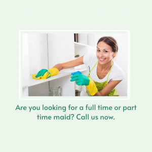 Woman cleaning white cabinets with a yellow cloth and wearing gloves