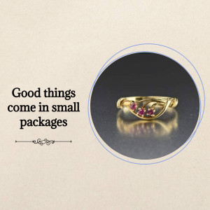 Close-up of a gold ring with three ruby gemstones