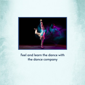 A dancer performing a handstand on stage with dramatic lighting.