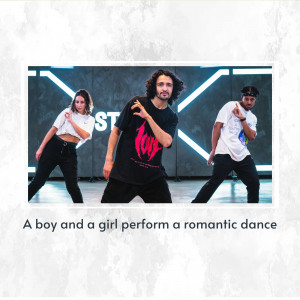 Three dancers performing a modern dance routine in a studio