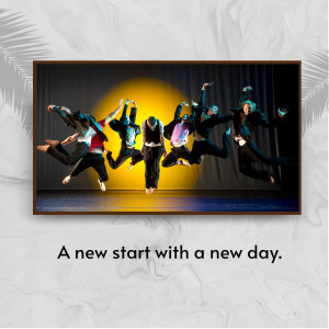 Group of dancers jumping on stage under a spotlight