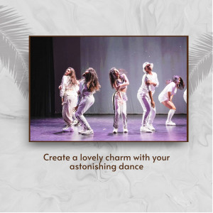 A group of dancers performing on stage, wearing matching outfits.