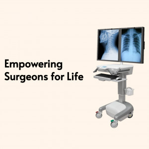 Medical workstation with dual monitors displaying X-ray images