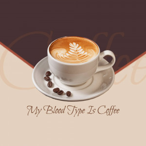 A white cup of latte art coffee with coffee beans on a saucer