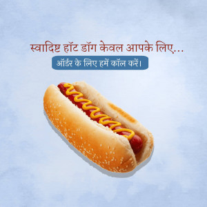 A close-up of a hot dog with mustard in a sesame seed bun.