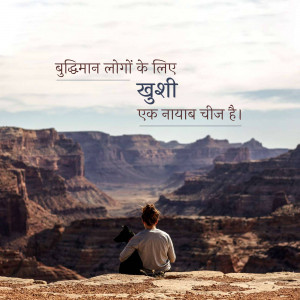 A person and a dog sitting on a cliff overlooking the Grand Canyon with text in Hindi.