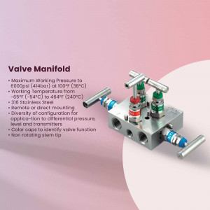 Silver valve manifold with green and red handles against a light pink and white background.