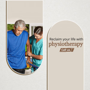A physiotherapist assisting a senior man with walking exercises.