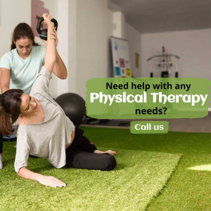Woman receiving physical therapy with a trainer assisting