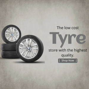 Stack of car tyres with promotional text for low cost tyre store.