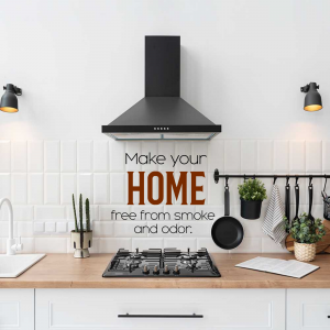 A clean, modern kitchen featuring a black range hood, gas stove, and white tile backsplash.