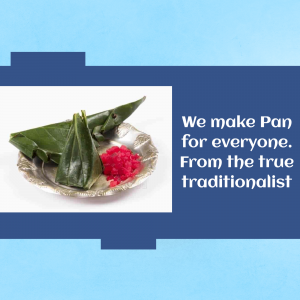 A silver plate with betel leaves, areca nut, and red paste, representing a traditional Pan offering.