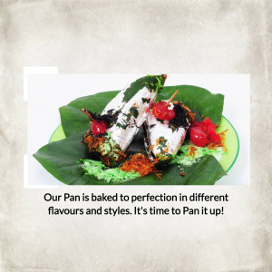 Pan Ice Cream served on a banana leaf with cherry and shredded coconut