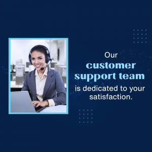 Customer support representative wearing a headset and smiling while working on a laptop.
