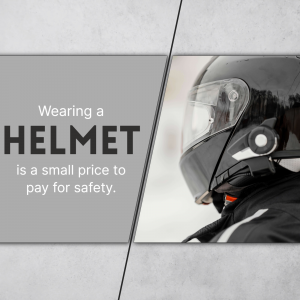 Motorcyclist wearing a black helmet with text emphasizing safety.