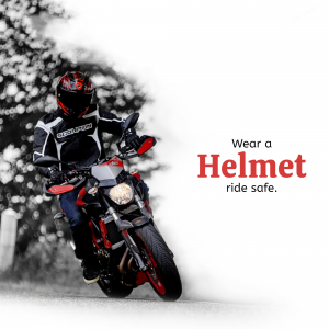 Motorcyclist wearing a helmet and riding a motorcycle